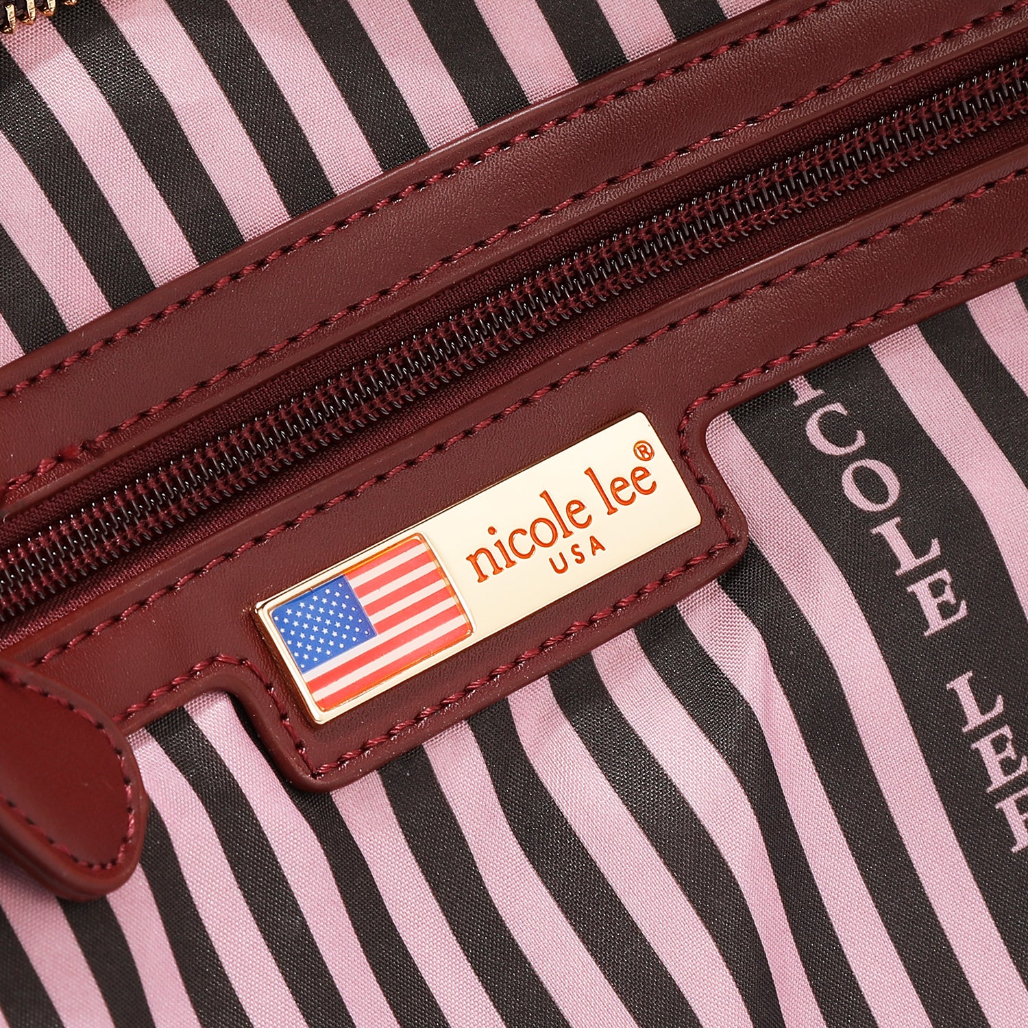 BOLSO BANDOLERA GEOMÉTRICO CORTADO A LÁSER (VINO)